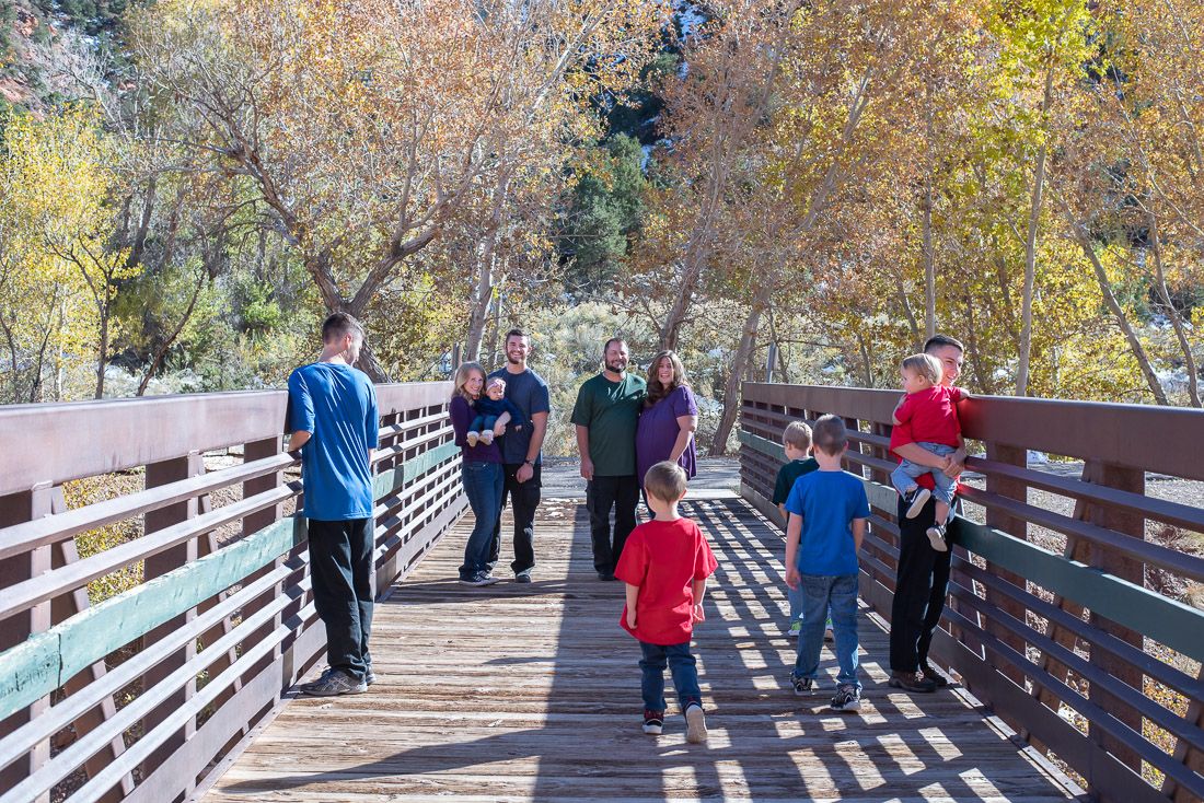 Family spread out across the Cedar canyon bridge-Bethany Allen, Utah family photographer
