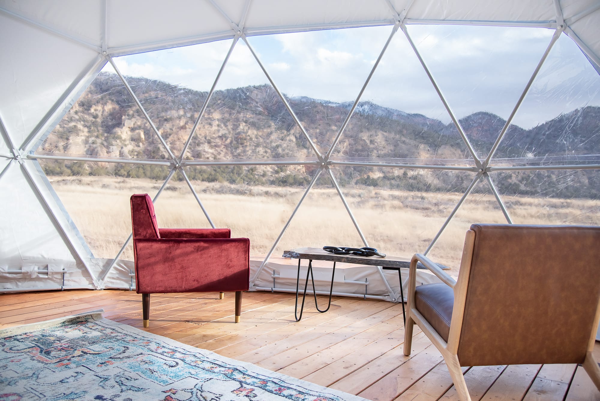 Looking out the window from inside the dome glamping tent