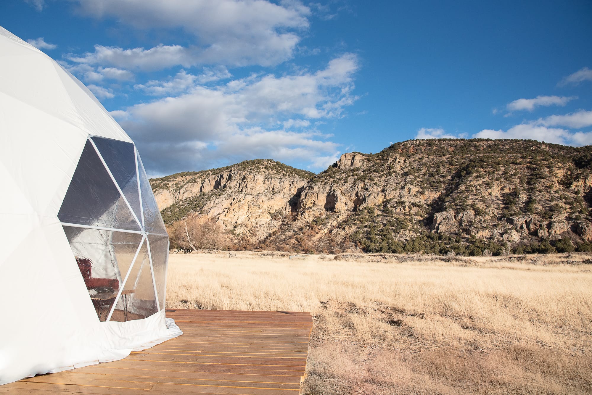 The dome tent window overlooking the mountains